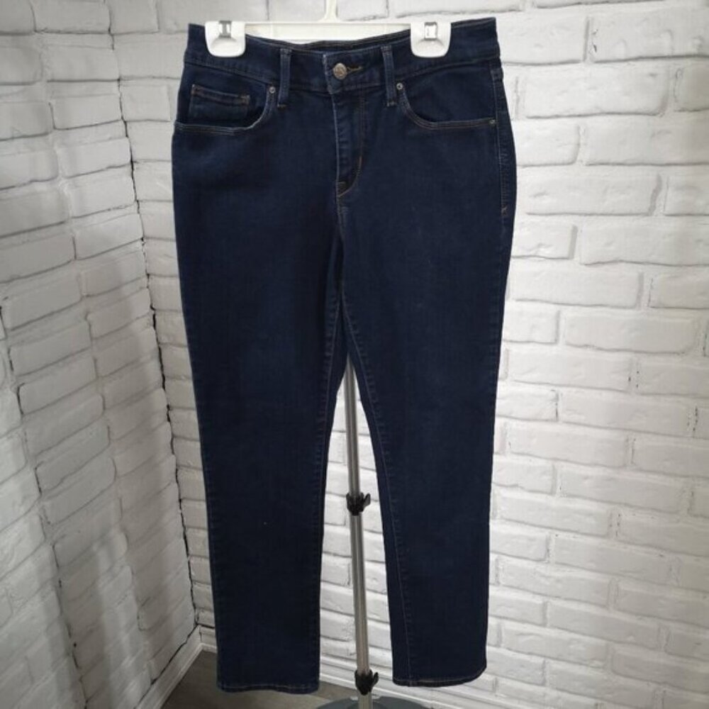Levis Ladies Size 4 Dark Wash Classic Mid Rise Skinny Blue Jeans